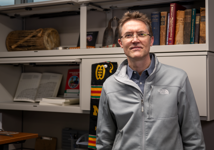 Dr. Lee Schroeder with Ghanian memorabilia